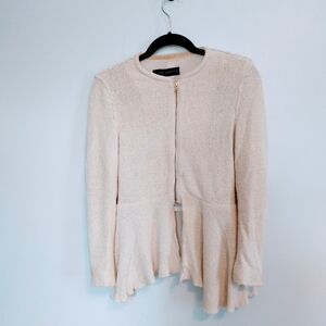 Zara beige peplum zip up sweater jacket, lined. Has zippers at the cuffs and raw